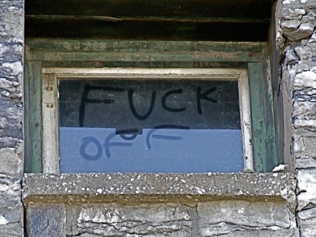 Kids probably wrote this, so why are you scared of saying something they’re writing on your goddam house?