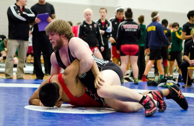 The Dogs’ Landon Squires earned his second consecutive silver medal at the national university wrestling championships March 3.