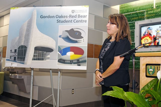 Irene Oakes with an artists’ rendering of the new Aboriginal Student’s Centre. 