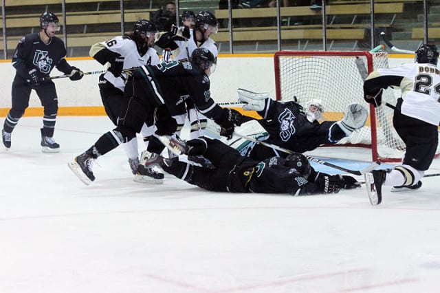 Huskies goalie Ryan Holfeld made 30 saves to shut out the Manitoba Bisons in a 5-0 triumph.