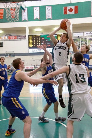 Evan Ostertag goes up and over Pronghorn defenders.