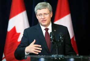 Is Harper hurting democracy in Canada?