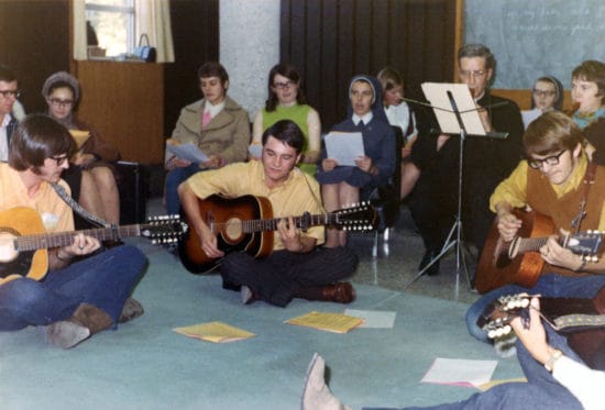 Murray Room Mass, Dennis Dorgan on guitar and Fr. William O'Brien, csb - Supplied - STM Archives