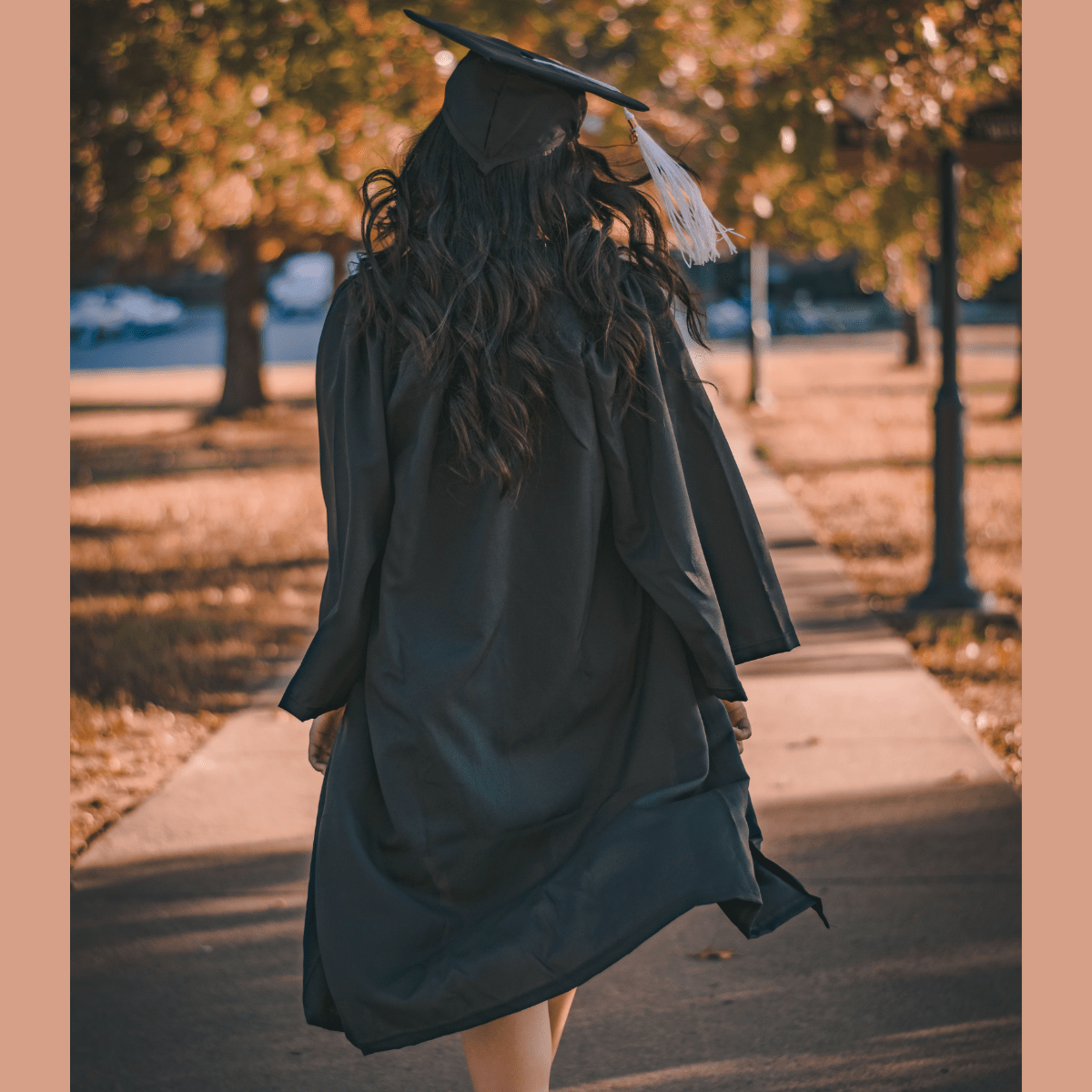 Woman in Black Long Dress Standing on Brown Concrete Pathway | Stanley Morales from Pexels | Canva Pro