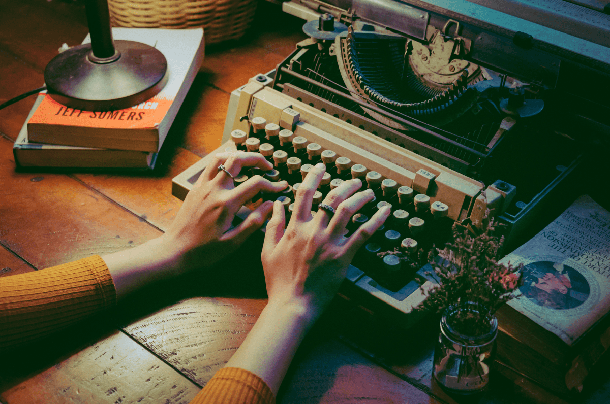 Person using a typewriter| Min An for Pexels | Canva Pro