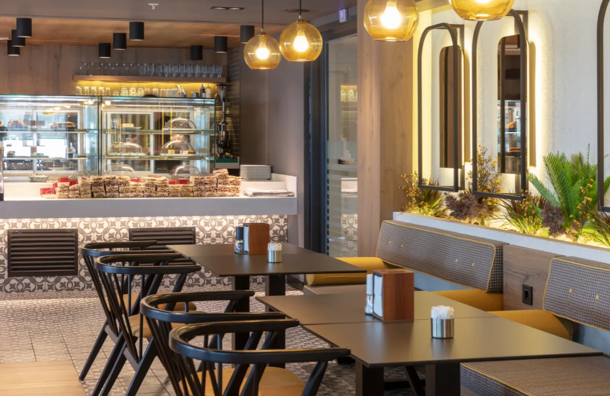 Empty cafeteria | JazzIRT Getty Images Signature | Canva Pro