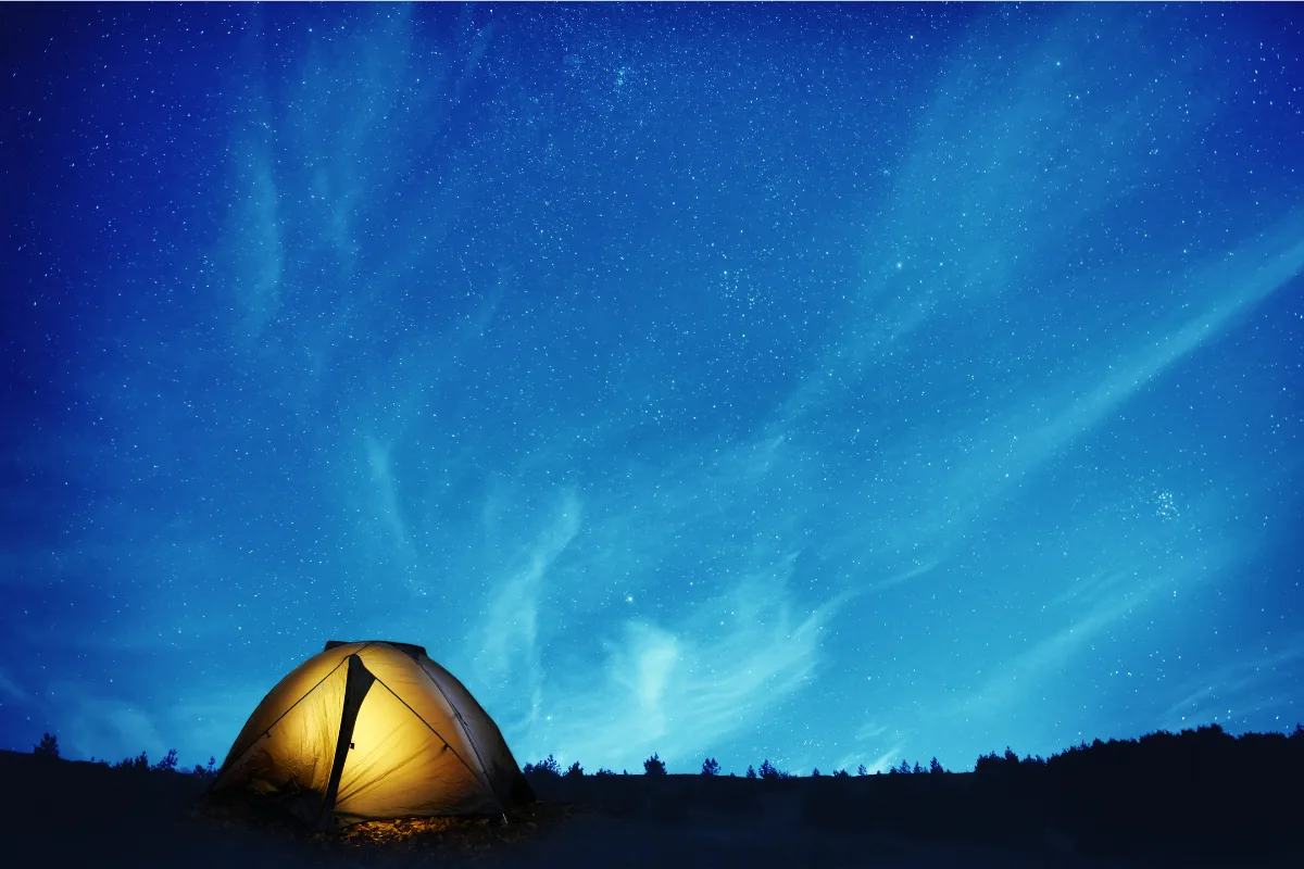 Illuminated Camping Tent at Night | Pavlovakhrushev | Canva Pro