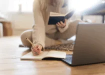 Researching and creative writing at home | Luza studios Getty Images Signature | Canva Pro