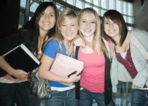 Cheerful Highschool Student Friends | Meshaphoto from Getty Images Signature | Canva Pro