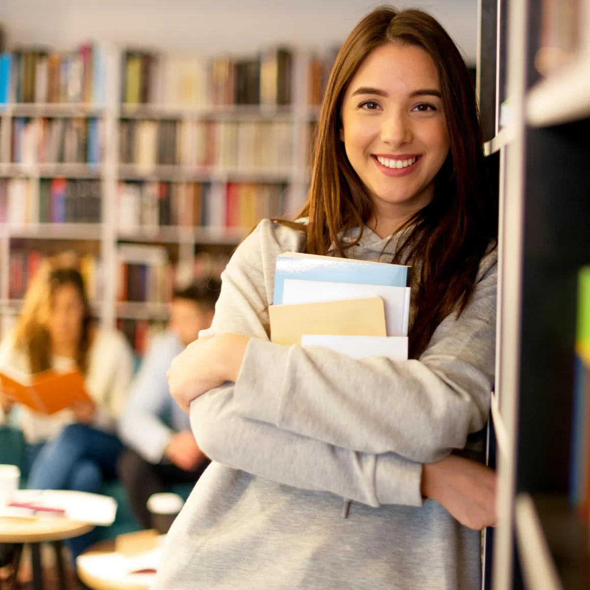 Students learning in a library | StockRocket from Getty Images Signature | Canva Pro