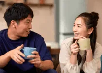 Couple enjoying coffee and conversation. | Aflo Images | Canva Pro