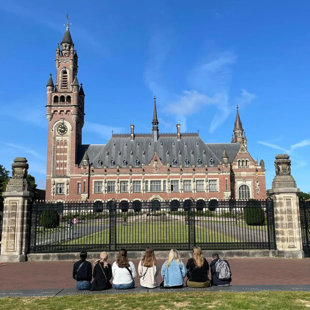 Students sitting outside the Peace Palace | Dr. Kristen Fisher