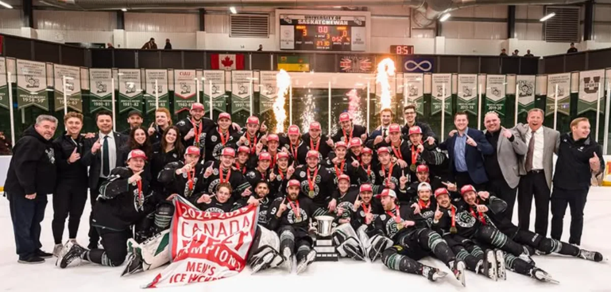 The Huskie Men’s Hockey team after winning Canada West last year. | Huskie Athletics