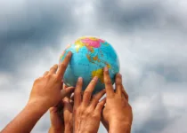 Hand holding globe | Sydeen from Getty Images | Canva Pro