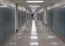 Highschool hallway lined with lockers | David Wood from Woody’s Photos | Canva Pro