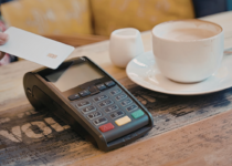 Payment card being used at a cafe | Canva Pro